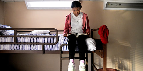A girl reading a book.
