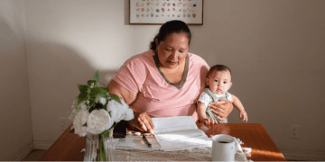 Woman paying her bills