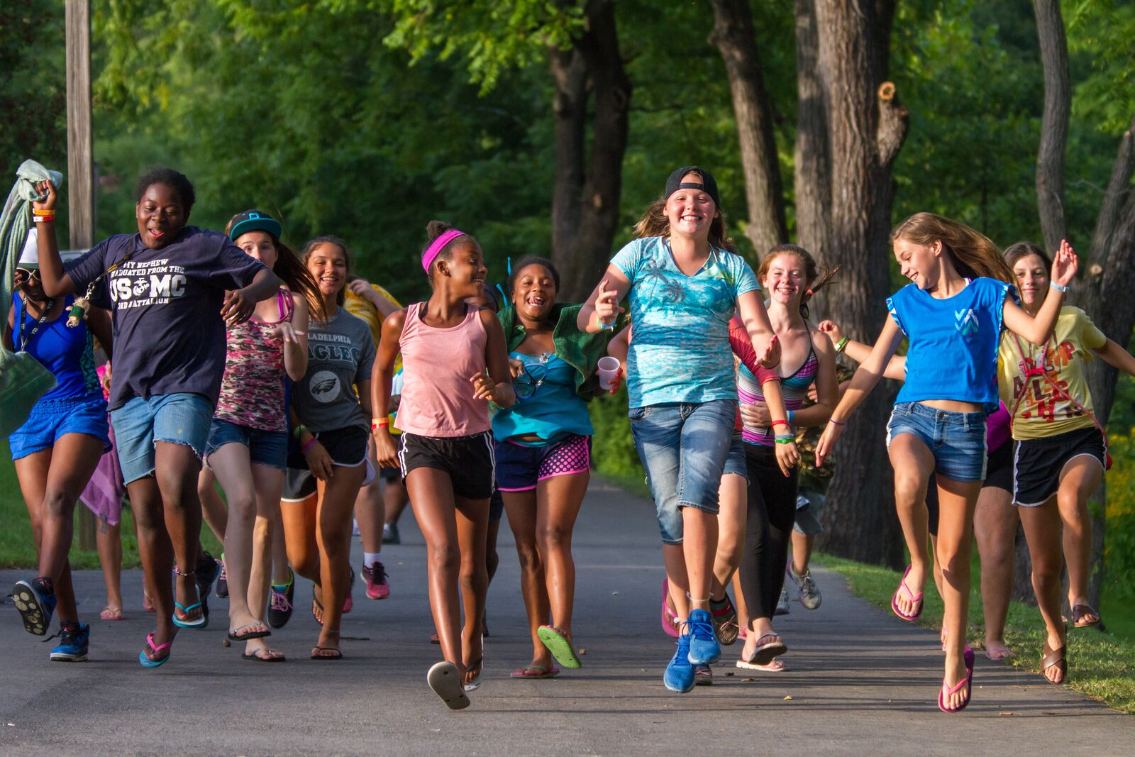 Group of girls running together at a Salvation Army summer camp