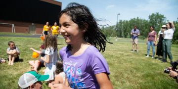 Group of campers playing on a field